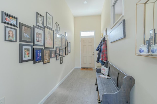 135 Lyle Hall Rd, Wilton, ME 04294 - corridor with light wood-style flooring and baseboards