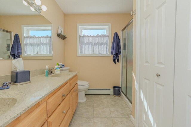 135 Lyle Hall Rd, Wilton, ME 04294 - full bathroom featuring baseboard heating, a shower stall, and double vanity