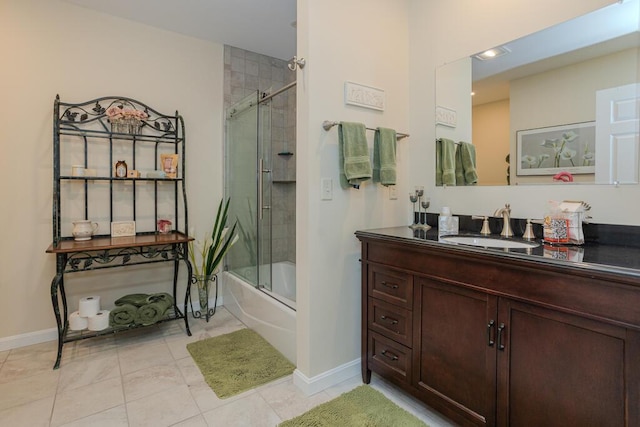 135 Lyle Hall Rd, Wilton, ME 04294 - full bath with vanity, shower / bath combination with glass door, tile patterned flooring, and baseboards