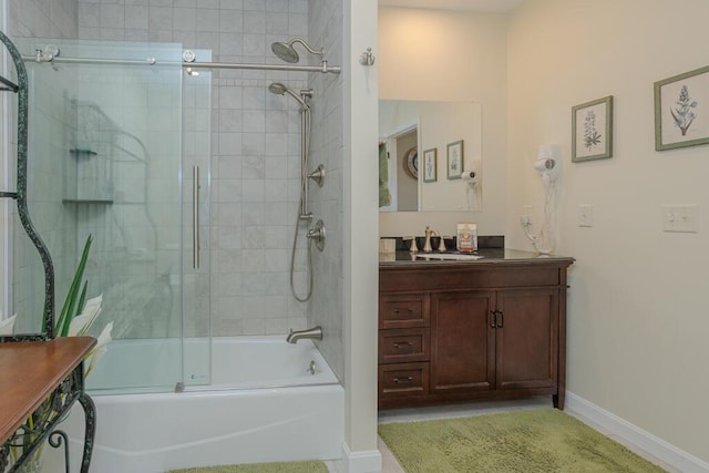 135 Lyle Hall Rd, Wilton, ME 04294 - full bath featuring vanity, shower / bath combination with glass door, and baseboards