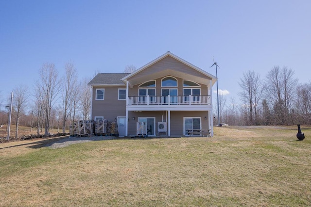 135 Lyle Hall Rd, Wilton, ME 04294 - back of property with a lawn and a balcony