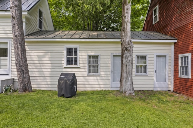 145 Pork Point Rd, Bowdoinham, ME 04008 - back of house featuring a lawn, metal roof, and a standing seam roof