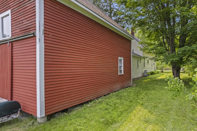 145 Pork Point Rd, Bowdoinham, ME 04008 - view of side of home featuring a lawn