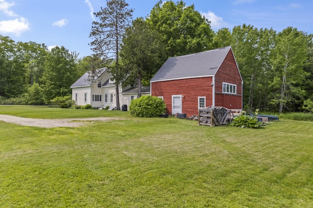 145 Pork Point Rd, Bowdoinham, ME 04008 - view of side of home with a lawn