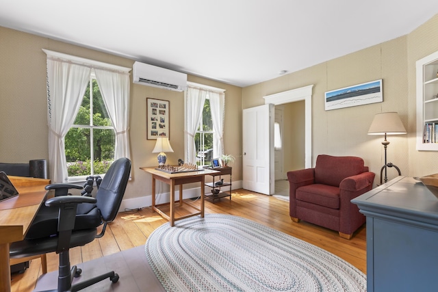 145 Pork Point Rd, Bowdoinham, ME 04008 - office space featuring a wall mounted AC, hardwood / wood-style floors, and healthy amount of natural light