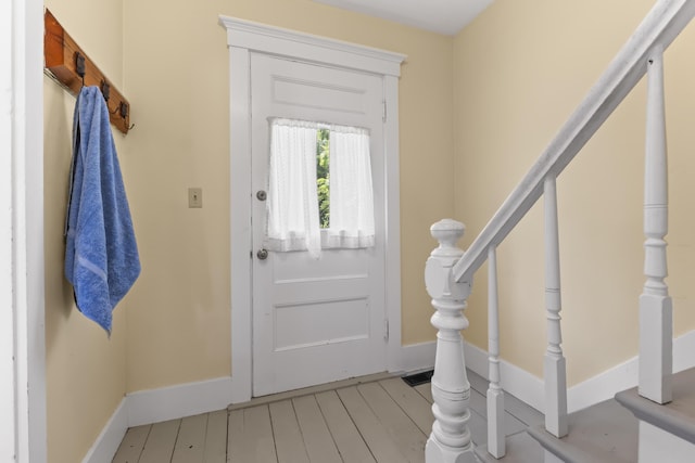 145 Pork Point Rd, Bowdoinham, ME 04008 - foyer featuring baseboards and stairs