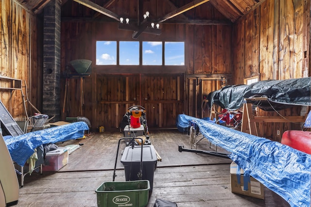 145 Pork Point Rd, Bowdoinham, ME 04008 - bedroom with wooden walls and hardwood / wood-style floors