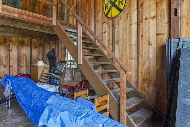 145 Pork Point Rd, Bowdoinham, ME 04008 - staircase featuring wood walls and wood finished floors