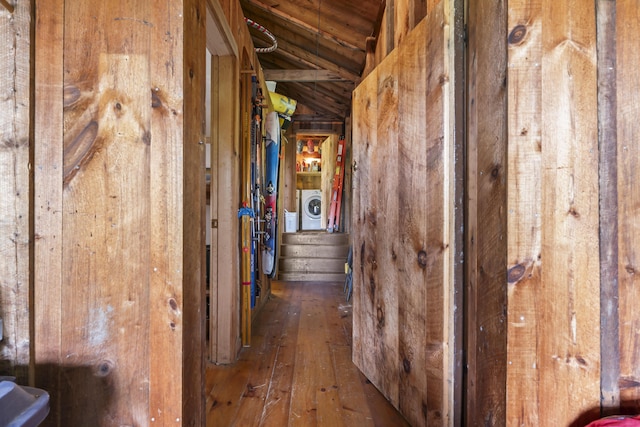 145 Pork Point Rd, Bowdoinham, ME 04008 - hall with washer / clothes dryer, lofted ceiling, and hardwood / wood-style flooring
