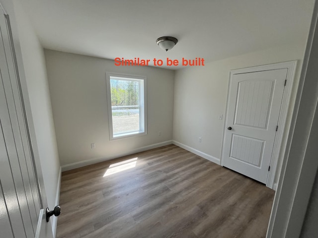 278 Merrill Rd, Levant, ME 04456 - empty room featuring wood finished floors and baseboards