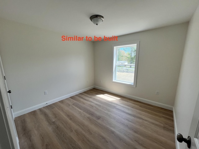 278 Merrill Rd, Levant, ME 04456 - empty room featuring wood finished floors and baseboards