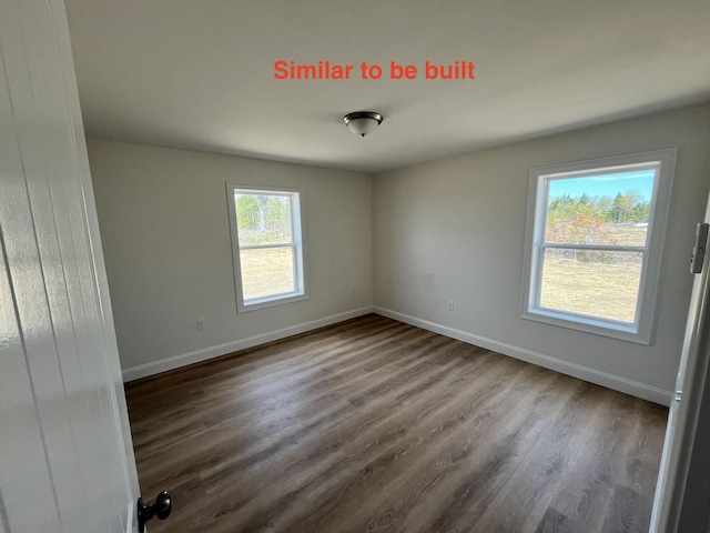 278 Merrill Rd, Levant, ME 04456 - spare room with dark wood-style flooring and baseboards