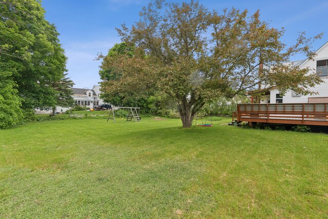 47 Beal St, Norway, ME 04268 - view of green lawn with a deck