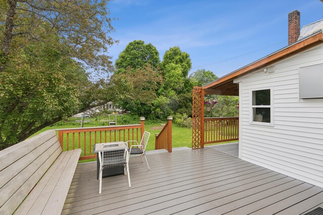 47 Beal St, Norway, ME 04268 - deck with outdoor dining area and a lawn