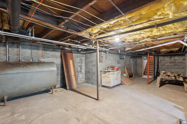 47 Beal St, Norway, ME 04268 - unfinished below grade area featuring heating fuel and stairway