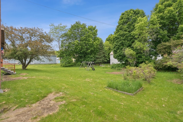 47 Beal St, Norway, ME 04268 - view of green lawn featuring a playground and stairway
