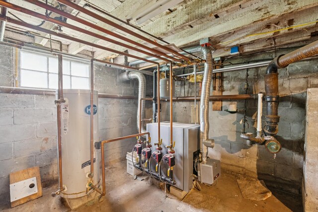 47 Beal St, Norway, ME 04268 - below grade area with water heater and a heating unit