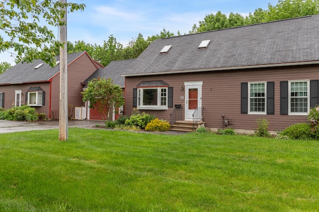 44 Cortland Cir Unit 44, Bangor, ME 04401 - cape cod house with driveway, a front yard, a garage, and roof with shingles