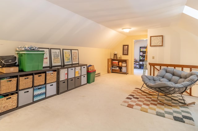44 Cortland Cir Unit 44, Bangor, ME 04401 - living area featuring vaulted ceiling, carpet flooring, and baseboard heating