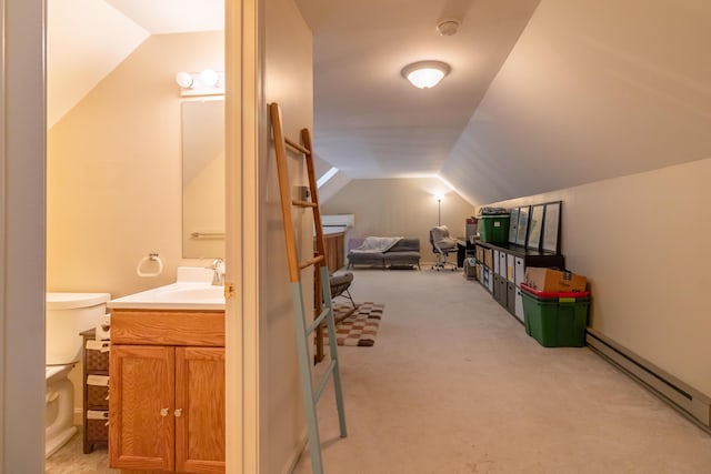 44 Cortland Cir Unit 44, Bangor, ME 04401 - bonus room with a baseboard radiator, vaulted ceiling, and light carpet