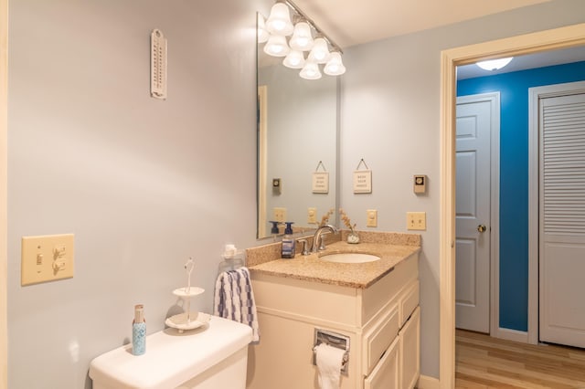 44 Cortland Cir Unit 44, Bangor, ME 04401 - bathroom featuring vanity and wood finished floors
