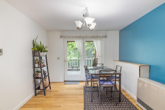 44 Cortland Cir Unit 44, Bangor, ME 04401 - dining space with wood finished floors and a chandelier