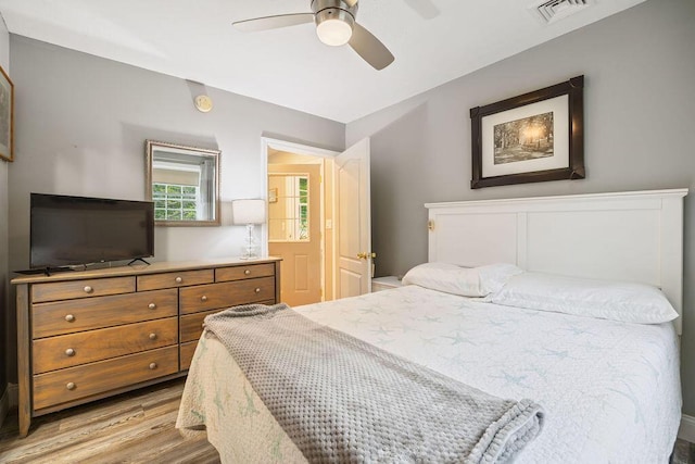 24 Dragon Back Rd, Naples, ME 04055 - bedroom with light wood-style floors and a ceiling fan