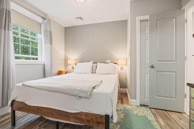 24 Dragon Back Rd, Naples, ME 04055 - bedroom with wood finished floors and baseboards