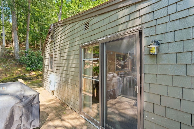 8 S Heritage Woods Ln, Winthrop, ME 04364 - view of exterior entry featuring a deck
