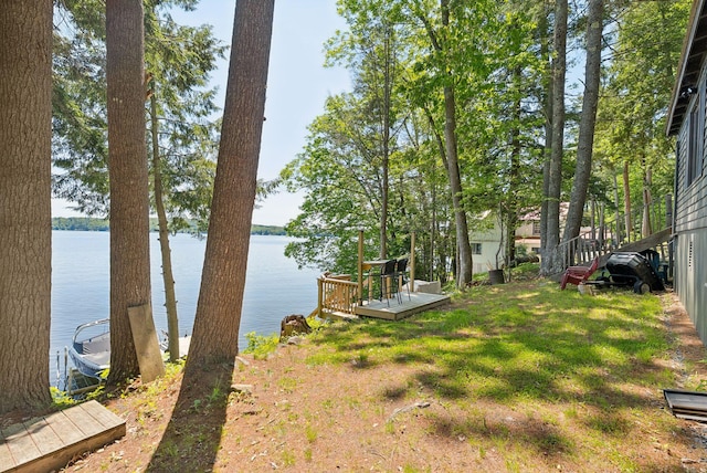 8 S Heritage Woods Ln, Winthrop, ME 04364 - view of grassy yard with a deck with water view