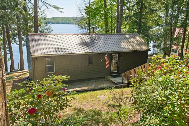 8 S Heritage Woods Ln, Winthrop, ME 04364 - view of front of home featuring a water view and metal roof