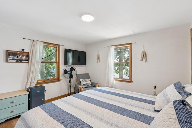 8 S Heritage Woods Ln, Winthrop, ME 04364 - bedroom with wood finished floors and baseboards