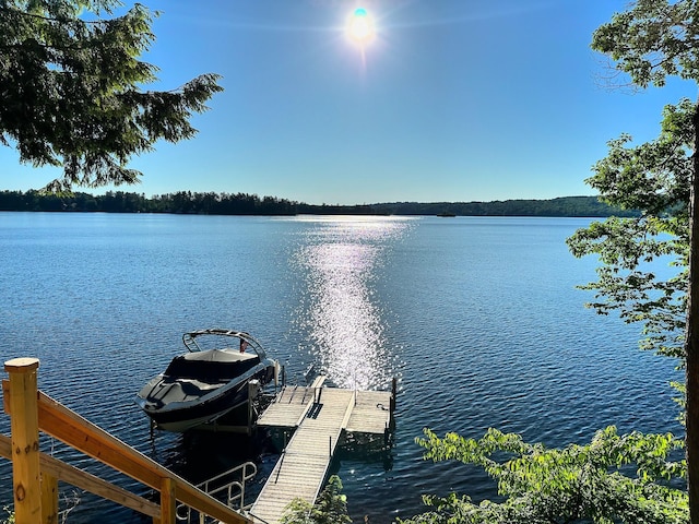 8 S Heritage Woods Ln, Winthrop, ME 04364 - dock with a water view and boat lift