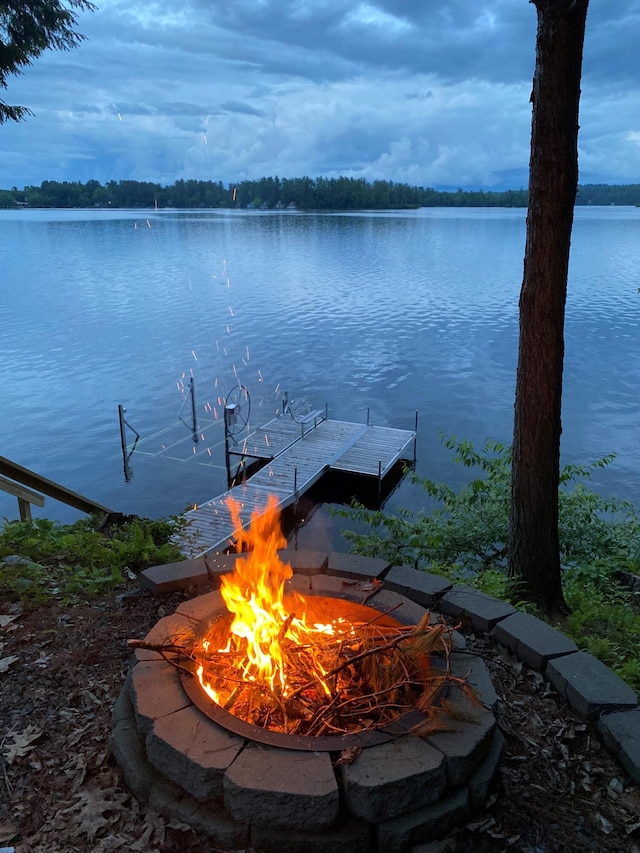 8 S Heritage Woods Ln, Winthrop, ME 04364 - dock area featuring a fire pit and a water view