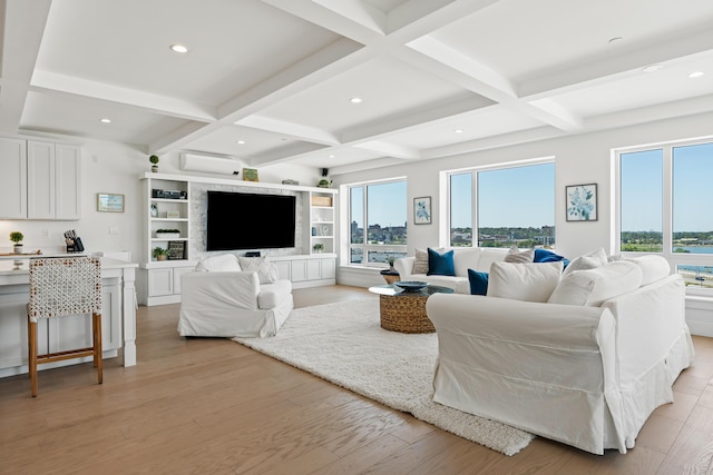 218 Washington Ave Unit 401, Portland, ME 04101 - living room with plenty of natural light, light wood finished floors, beamed ceiling, coffered ceiling, and recessed lighting