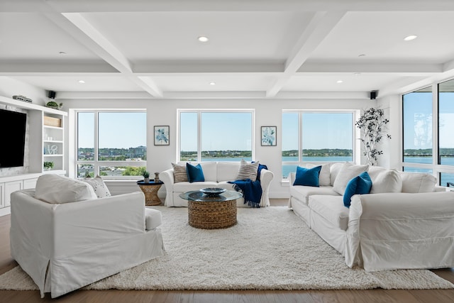 218 Washington Ave Unit 401, Portland, ME 04101 - living room featuring coffered ceiling, healthy amount of natural light, beam ceiling, wood finished floors, and recessed lighting