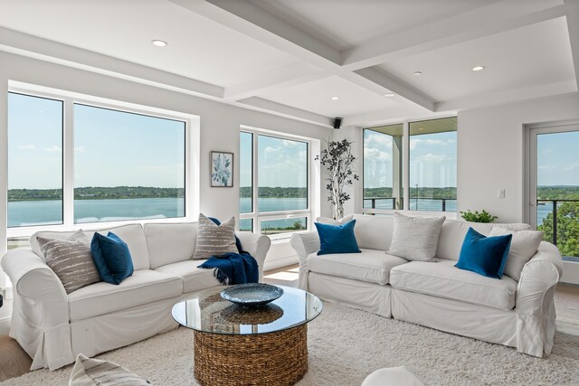 218 Washington Ave Unit 401, Portland, ME 04101 - living room featuring beamed ceiling, a water view, recessed lighting, and coffered ceiling