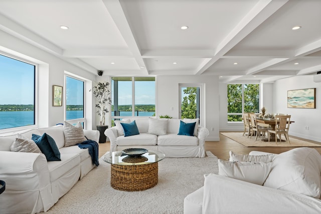 218 Washington Ave Unit 401, Portland, ME 04101 - living area featuring coffered ceiling, beam ceiling, wood finished floors, recessed lighting, and a water view