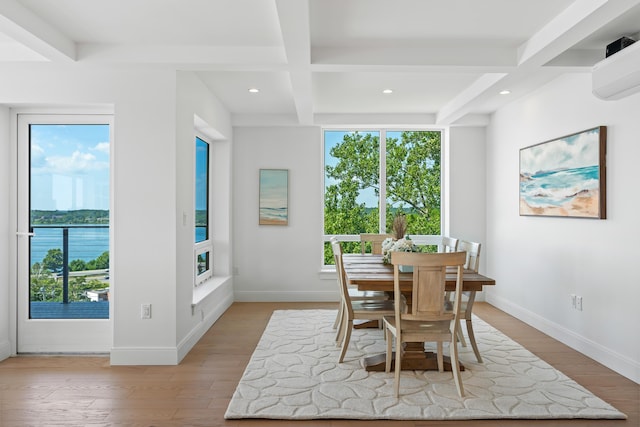 218 Washington Ave Unit 401, Portland, ME 04101 - dining area with healthy amount of natural light, beam ceiling, light wood-style floors, coffered ceiling, and recessed lighting