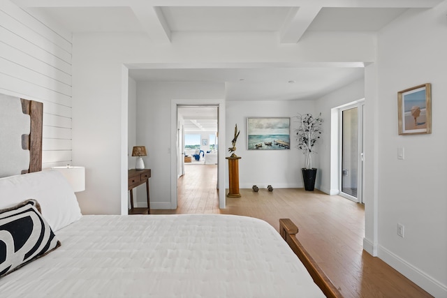 218 Washington Ave Unit 401, Portland, ME 04101 - bedroom featuring hardwood / wood-style flooring and beam ceiling