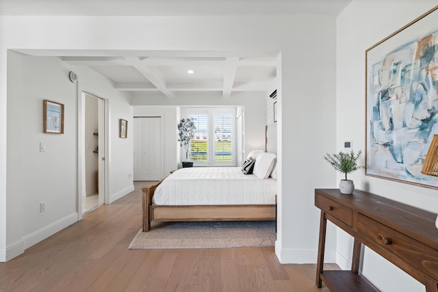 218 Washington Ave Unit 401, Portland, ME 04101 - bedroom with coffered ceiling, beamed ceiling, light wood-style flooring, and recessed lighting