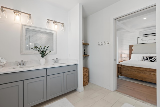 218 Washington Ave Unit 401, Portland, ME 04101 - full bathroom featuring an AC wall unit and double vanity