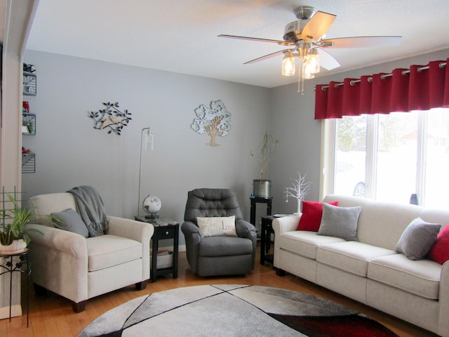 369 Grove St, Lewiston, ME 04240 - living area with light wood-style floors and a ceiling fan