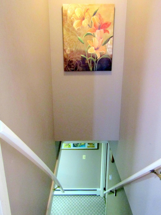 369 Grove St, Lewiston, ME 04240 - stairs featuring a baseboard heating unit and carpet floors