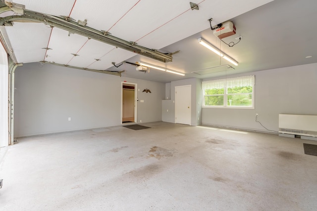 369 Grove St, Lewiston, ME 04240 - garage featuring a garage door opener