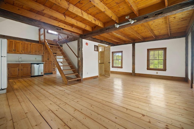 427 Haley Rd, Kittery, ME 03905 - unfurnished living room with light wood-type flooring, wood ceiling with exposed beams, stairway, baseboards, and a sink