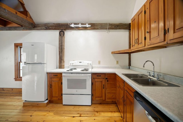 427 Haley Rd, Kittery, ME 03905 - kitchen with white appliances, a sink, brown cabinetry, and light countertops