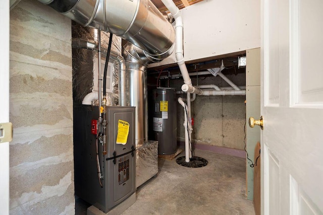 427 Haley Rd, Kittery, ME 03905 - utility room with electric water heater and drainage system