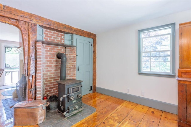 15 Feylers Corner Rd, Waldoboro, ME 04572 - living area featuring a wood stove and light wood-style floors