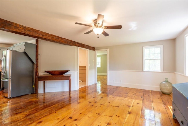 15 Feylers Corner Rd, Waldoboro, ME 04572 - unfurnished living room featuring wood-type flooring, a ceiling fan, and plenty of natural light